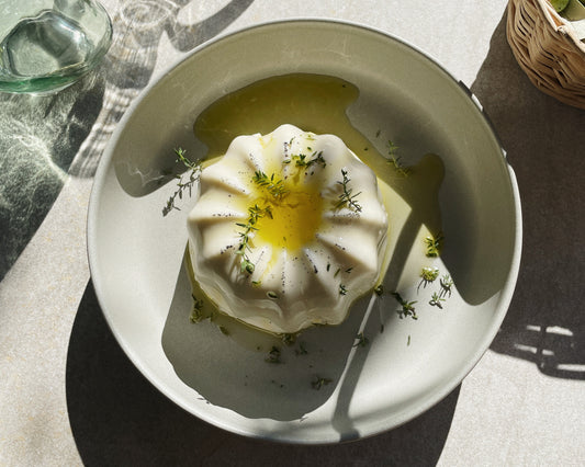 Panna cotta all'olio nuovo e timo