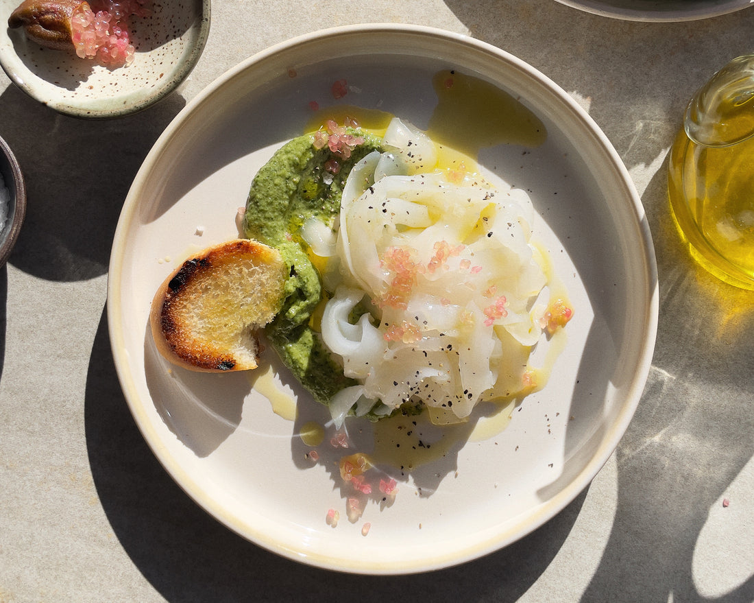 Calamaro marinato e caviale di limone